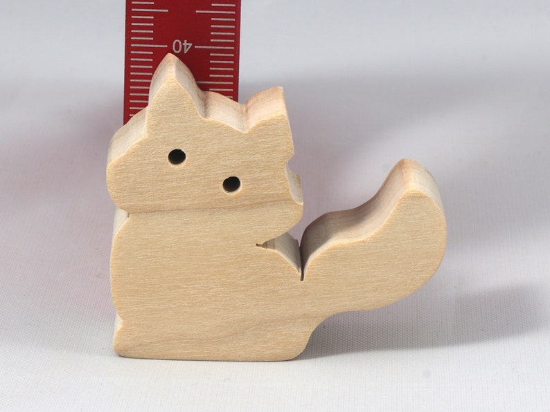 Handmade and unfinished, this stackable toy kitten cat cutout is ready to paint. This unpainted cutout is an excellent option for a fun DIY project or as a pretend toy for children. Available in several sizes, including custom orders.