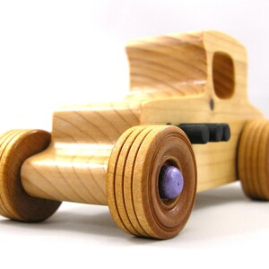 Handmade wooden toy car Hot Rod '27 T-Coupe handmade and finished with nontoxic amber shellac with metallic purple and black trim. From my Hot Rod Collection.