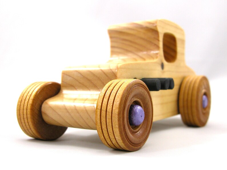 Handmade wooden toy car Hot Rod '27 T-Coupe handmade and finished with nontoxic amber shellac with metallic purple and black trim. From my Hot Rod Collection.