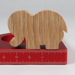 Handmade wooden toy Elephant cutout from the Itty Bitty Animal Collection stackable and unfinished crafted with traditional tools in the USA. Ideal for kid's crafts or pretend play, ready to be personalized to inspire creativity and imagination.