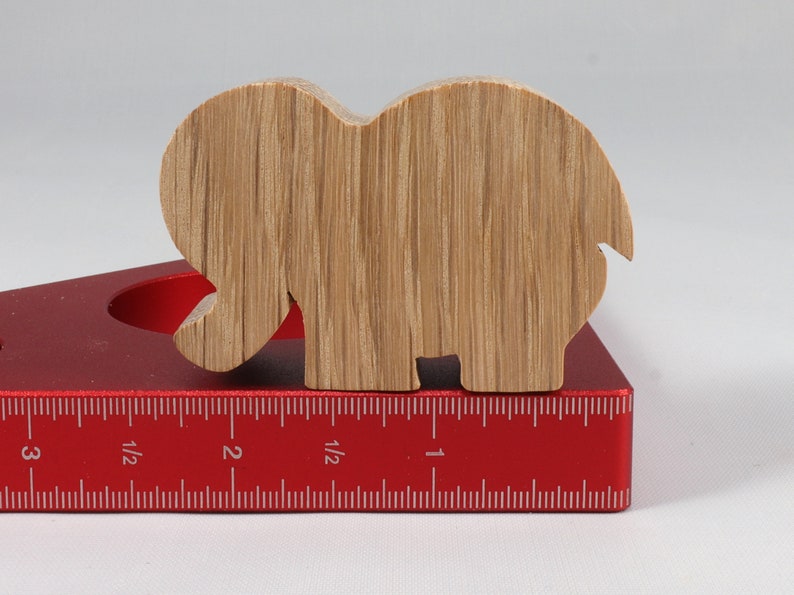 Handmade wooden toy Elephant cutout from the Itty Bitty Animal Collection stackable and unfinished crafted with traditional tools in the USA. Ideal for kid's crafts or pretend play, ready to be personalized to inspire creativity and imagination.