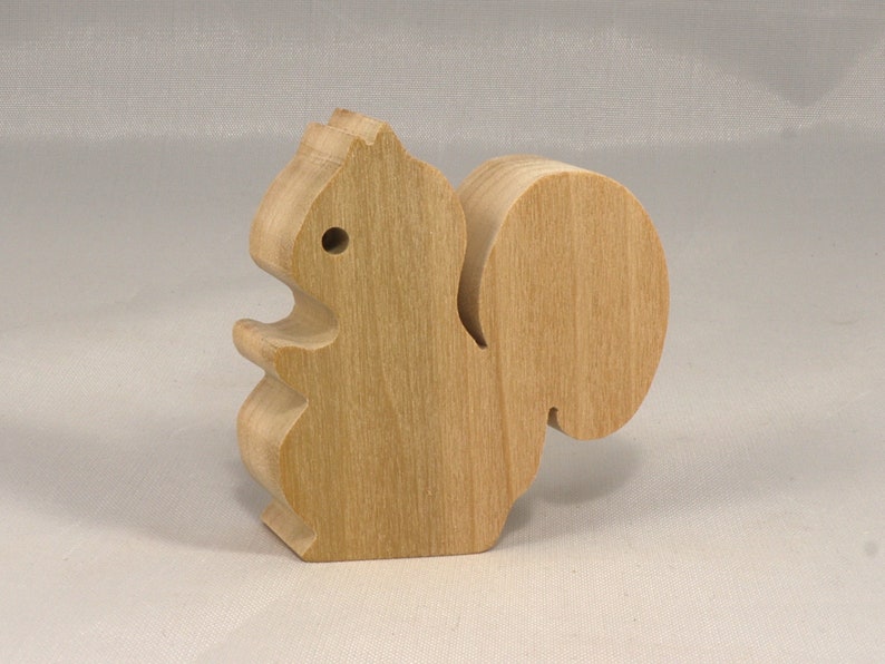 Handmade wood toy squirrel cutout is unfinished, unpainted, paintable, ready to paint, and freestanding from my Itty Bitty Animal Collection.
