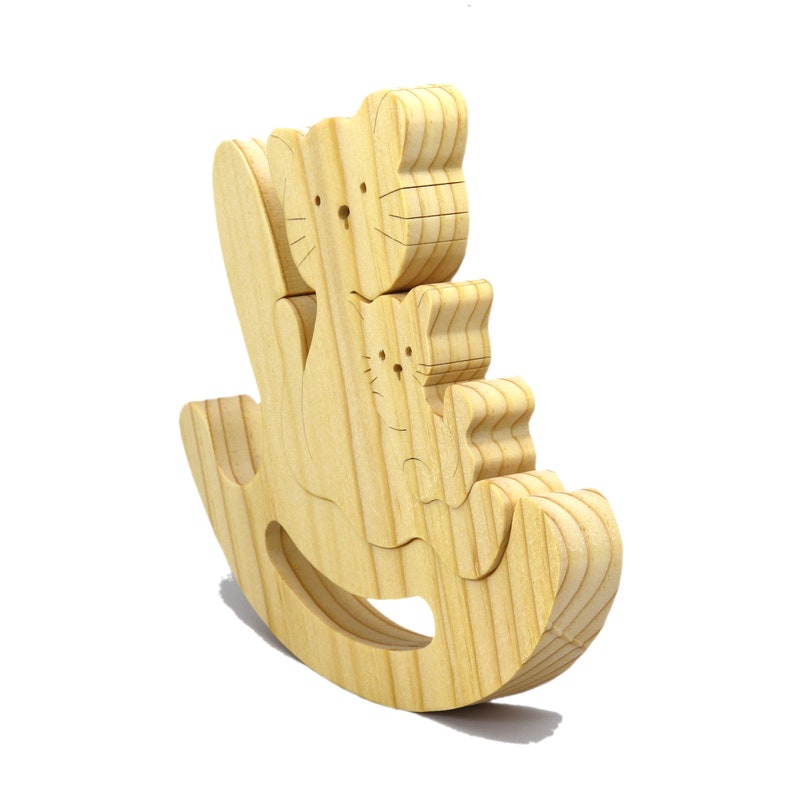 Handmade Wood Puzzle featuring Moma Cat and Baby Kitten in a Rocker, a simple three-part design crafted with traditional woodworking tools. Smoothly sanded and finished with a blend of mineral oil and beeswax for a lustrous touch.