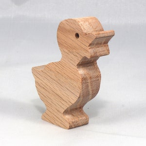 Wooden duck cutout, handmade, unfinished, and unpainted, from the Itty Bitty Animal Collection. Natural wood, freestanding, stackable, and paintable. Suitable for crafts or toys, American-made