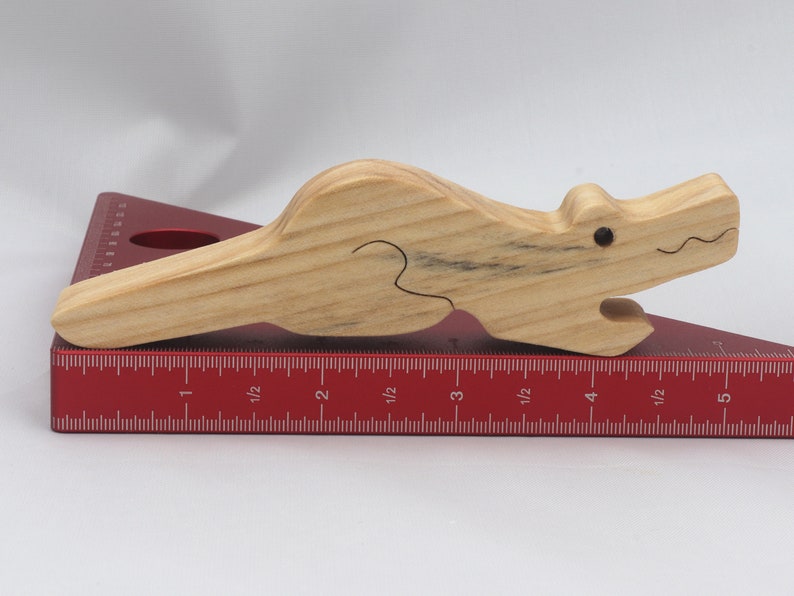 Handmade Wood Alligator Family Stacking Puzzle Mom and five baby (hatchling) alligators. This freestanding puzzle is hand-finished with a custom blend of mineral oil and waxes for a beautiful, smooth, and durable finish.