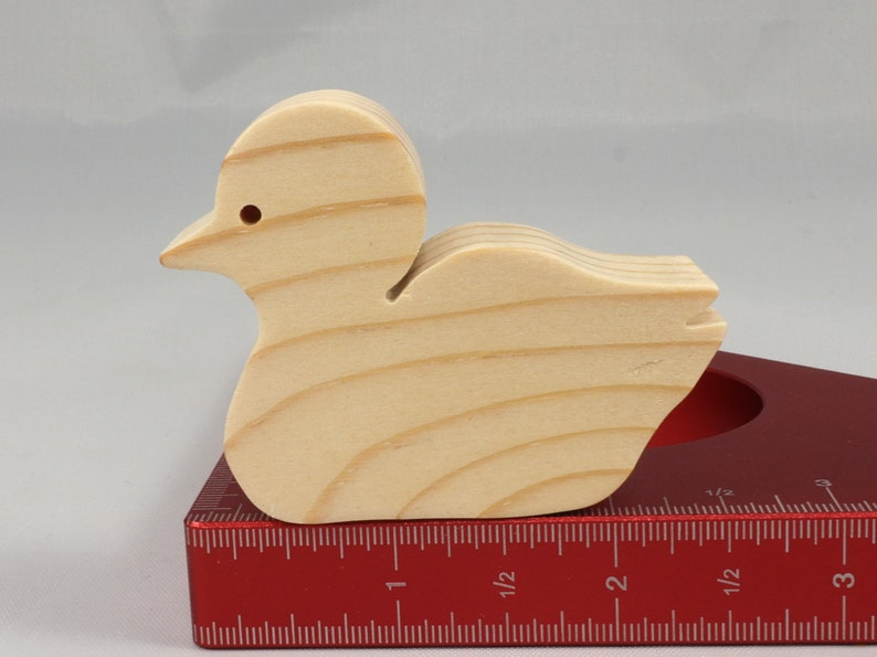 Handcrafted 2 inchwooden toy duck cutout made from 3/4-inch thick wood.