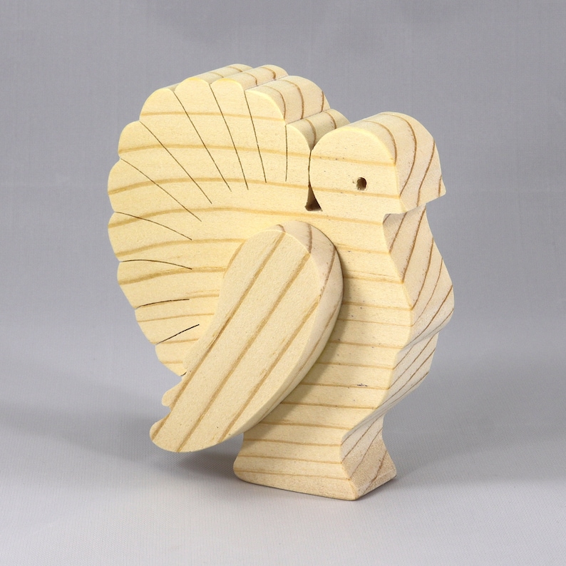Handmade 3D layered freestanding wooden turkey figurine, unfinished and unpainted. Perfect for Thanksgiving decor, crafts, or as a toy.