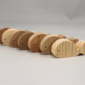 Handmade unfinished wooden whale toy cutout, chunky freestanding and stackable, sanded smooth and ready to paint, natural wood blank for kids craft and ocean theme play.