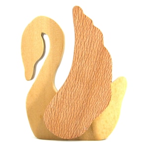 Handmade wooden swan figurine crafted from contrasting reclaimed hardwoods, sanded and ready to finish, and made in the USA.