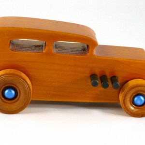 Handmade Wood Toy Car Hot Rod 1932 Sedan Finished With Amber Shellac And Trimmed With Metallic Saphire Blue And Black Acrylic Paint From My Hot Rod Collection