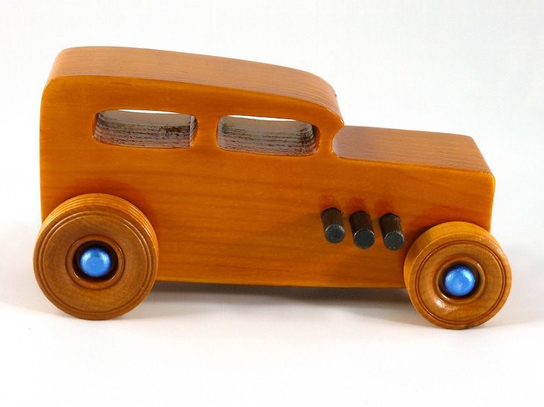 Handmade Wood Toy Car Hot Rod 1932 Sedan Finished With Amber Shellac And Trimmed With Metallic Saphire Blue And Black Acrylic Paint From My Hot Rod Collection