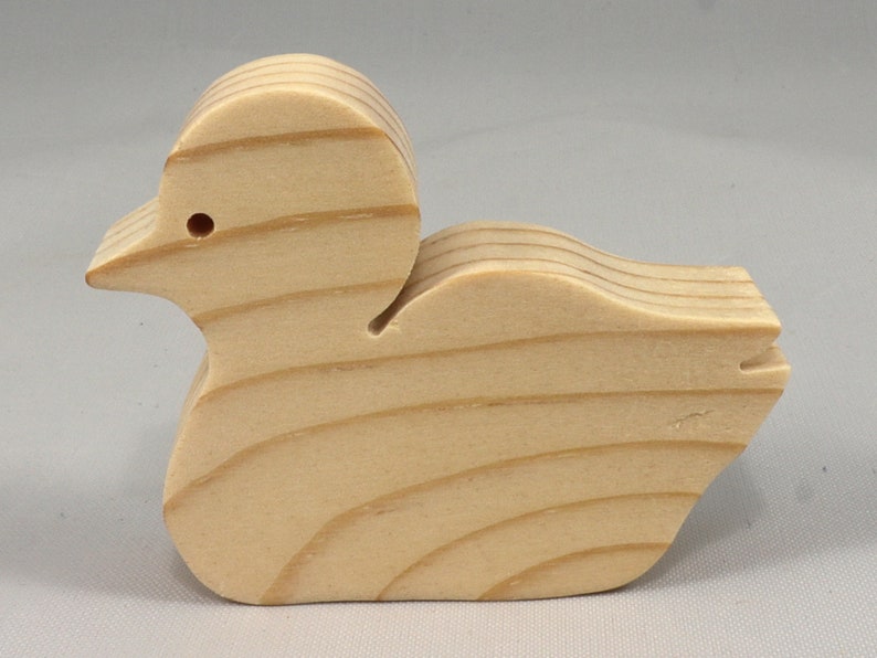 Handcrafted 2 inchwooden toy duck cutout made from 3/4-inch thick wood.