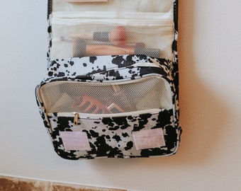Schwarze Kuhfell Duschtasche