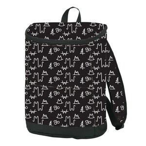 May include: Black backpack with a white pattern of mountains, trees, and a symbol that looks like a cowboy hat. The pattern is repeated all over the backpack.