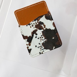 Bolsillo para teléfono de piel de vaca marrón