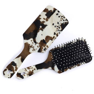 Cepillo para el pelo de piel de vaca marrón