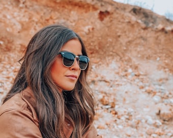 Gafas de sol doradas sin montura