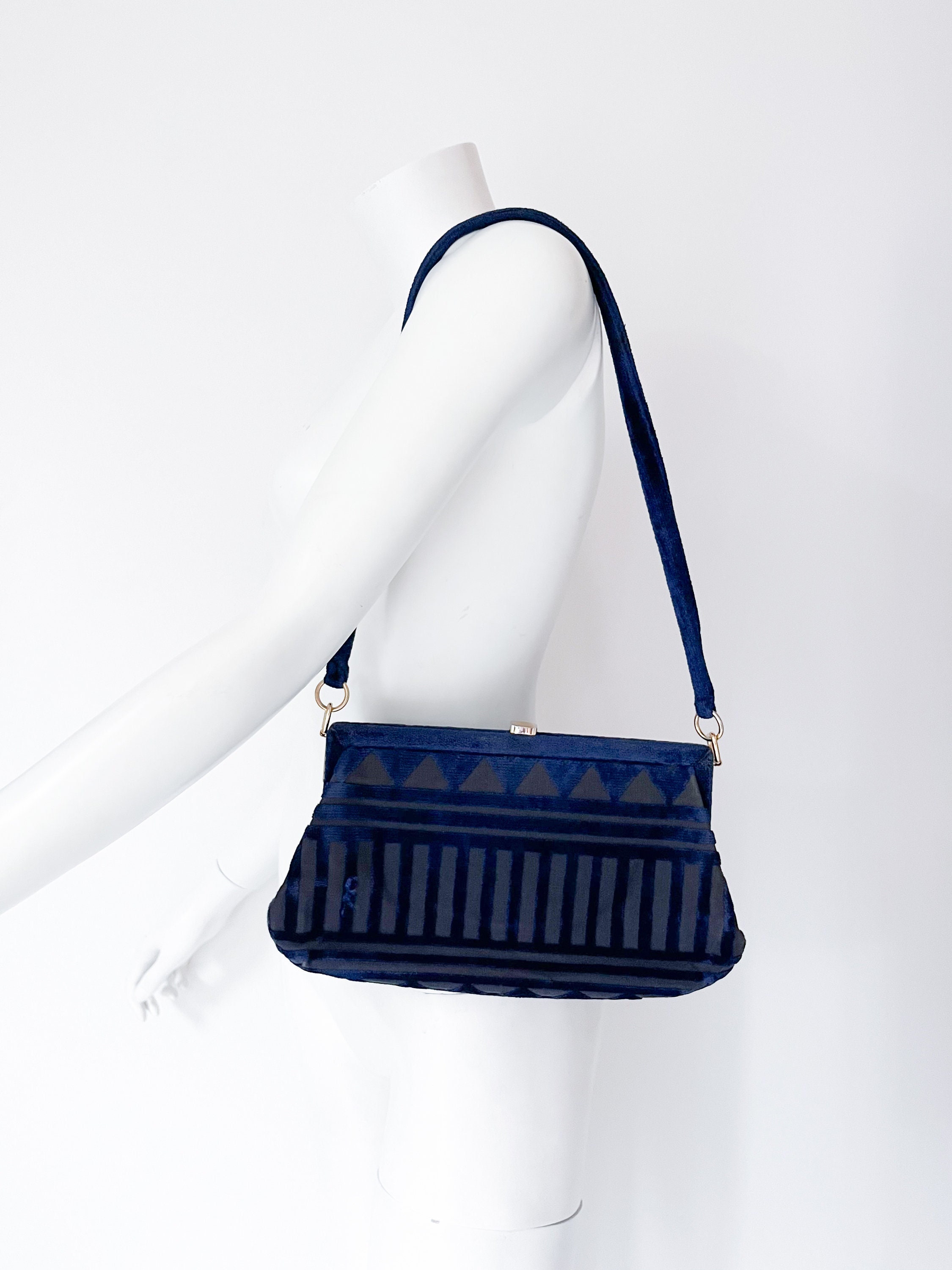 Navy blue shop velvet handbag