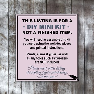 May include: A pink sign with black text on a wooden background. The sign reads "THIS LISTING IS FOR A - DIY MINI KIT - NOT A FINISHED ITEM." It also states that the kit requires assembly and does not include tools.