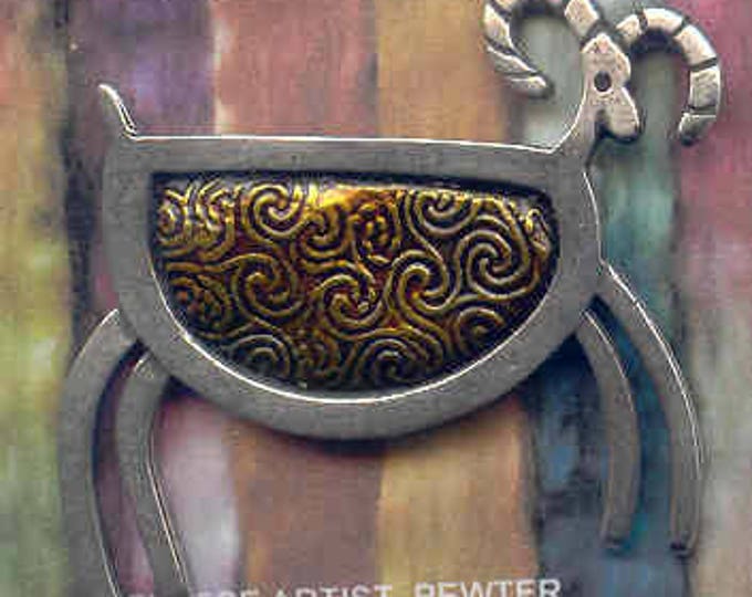 Brooch: GOLD pewter petroglyph sheep brooch.