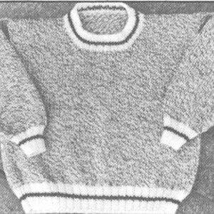 May include: A gray and white knit sweater with a crew neck and long sleeves. The collar, cuffs, and hem feature white and dark trim. The sweater is made of a textured yarn.