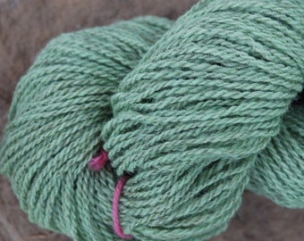 Soft green sport weight wool hand dyed yarn from our USA farm, free shipping offer