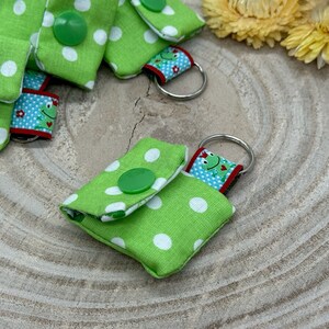 Llavero mini bolso con chip para carrito de compra práctico mini monedero lunares verde/blanco