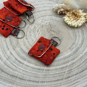 Llavero mini bolso con ficha de carrito de la compra, práctico mini bolso rojo con hojas