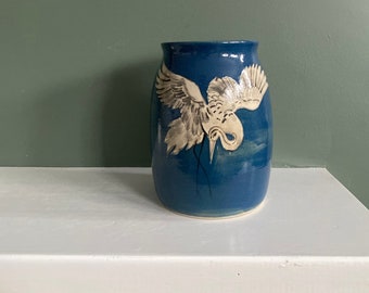 Stoneware vase with hand painted crane design on both sides, dark blue and grey