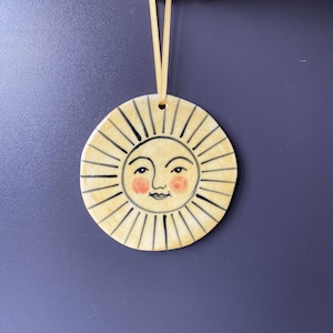 Hand-Painted Porcelain Sun Hanging Decor: Ceramic Ornament