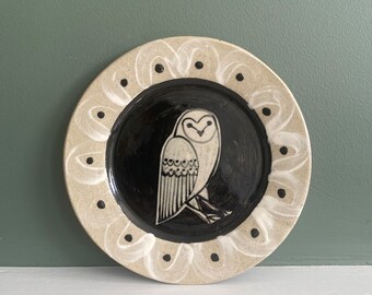 Owl small Stoneware plate with Bird Illustrated round with black background colour and bird line illustration.