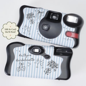 May include: Two black disposable cameras wrapped in light blue and white striped paper. The labels feature black line art of bouquets, champagne glasses, and bows. Text includes "Kaitlyn's Bachelorette" and "Kaitlyn's Bach April 2027" with a flash unit.