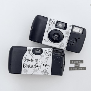 May include: Two black disposable cameras with white labels. One label reads "30" and "Happy Birthday Brittney, turn on the flash." The other reads "Brittney's Birthday." Both have doodle-style illustrations.