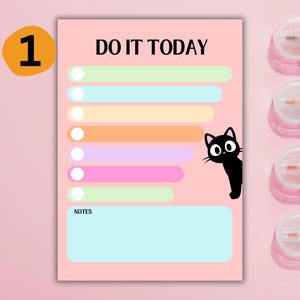 May include: A pink to-do list notepad with the text "DO IT TODAY" and a cartoon black cat. The notepad features colorful sections for tasks and a notes section. A set of colorful highlighters is visible.