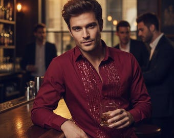 May include: A burgundy button-down shirt with sequin embellishments down the front. The long-sleeved shirt is worn in a bar setting, with a person holding a glass of amber liquid. The background includes a bar and other people.