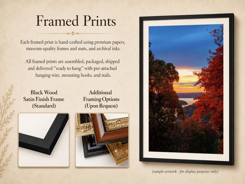 May include: A framed print featuring a landscape photograph of a sunset over a body of water framed by autumn trees. The display includes text about framed prints, a black satin finish frame, and additional ornate frame options.