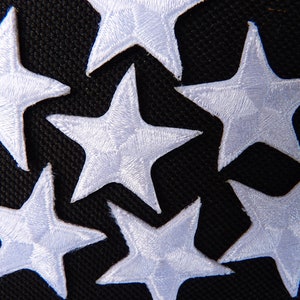 White star patches &gt; embroidered &gt; white iron-on stars &gt; 1&quot; (25mm) from point to point &gt; hand finished &gt; reward stars