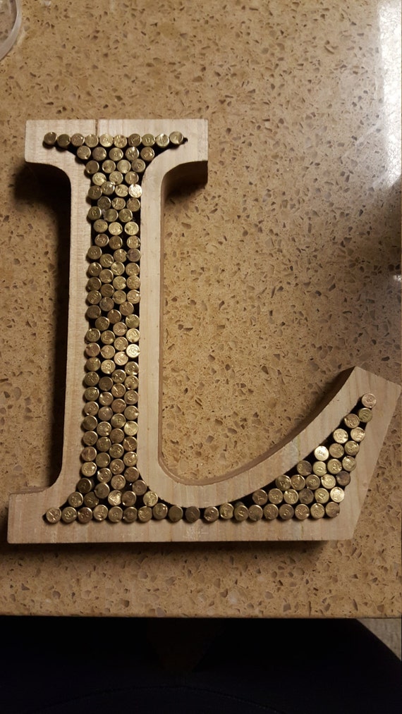 Items similar to Decorative bullet casing letter made with .22 shell
