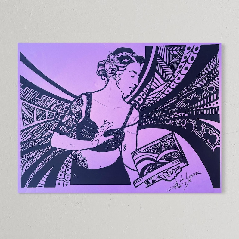 May include: A black and white illustration on a lavender background. The artwork depicts a woman holding a book, with intricate patterns and designs. The image includes the number "8" and the artist's signature.