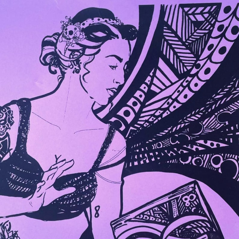 May include: A black and white illustration of a woman with tattoos, a skull headpiece, and a patterned design. The woman is holding a book with a geometric design. The background is a solid lavender color.