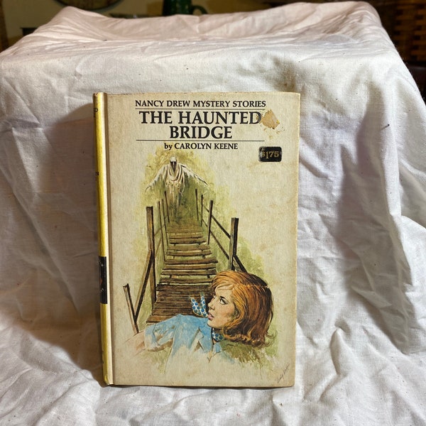 The Haunted Bridge by Carolyn Keene. Nancy Drew