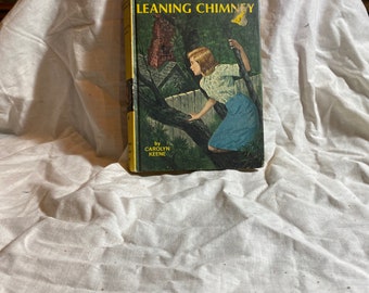 The Clue of the Leaning Chimney by Carolyn Keene. Nancy Drew