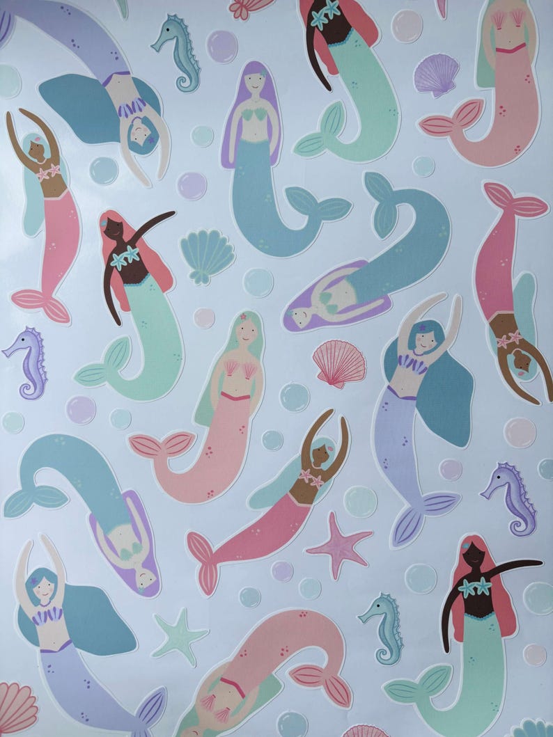 May include: A pattern of mermaids in various poses and colors, including pink, blue, and green, with starfish, seashells, and seahorses on a light blue background. The mermaids have different skin tones and hair colors.