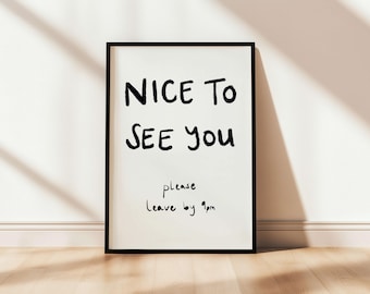 May include: Black framed print with white background and black text that reads "NICE TO SEE YOU" and "please leave by 9am".