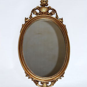 Antique oval mirror