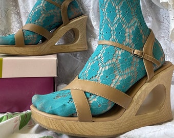 DEADSTOCK Cuñas recortadas de cuero y madera de la década de