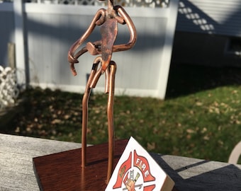 Copper Art Figurine of a firefighter