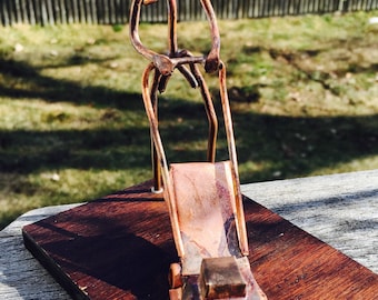 Copper Art Figurine of a landscaper/ lawn mower