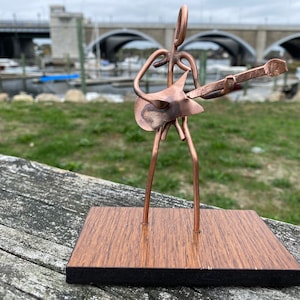 Copper Art Figurine of a guitarist / bass