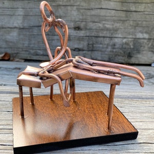 Copper Art Figurine of a chiropractor